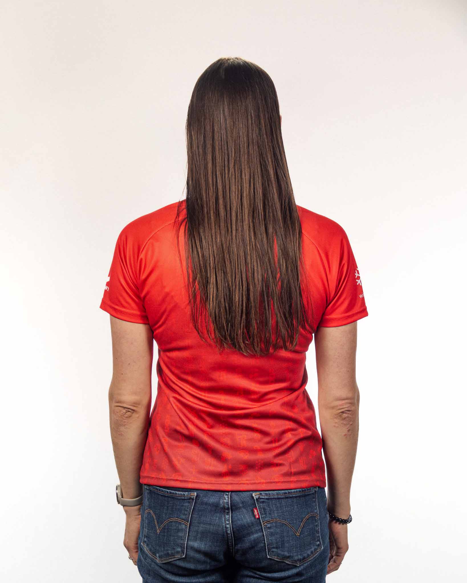 Frau im Hopp Schwiiz Trikot von HARWY